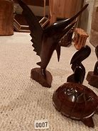 Image result for Wood Carved Animals