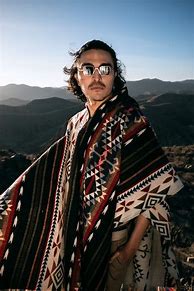 Image result for Man Wearing Poncho