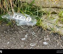 Image result for Unwrapped Alchohol Bottle