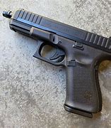 Image result for Threaded Barrel 22 Pistol