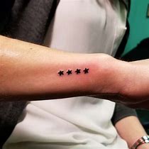 Image result for Small Star Tattoos On Wrist