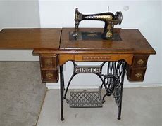 Image result for Singer Treadle Sewing Machine