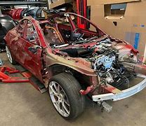 Image result for Smashed Tesla