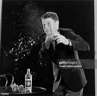 Image result for Man Spitting Drink