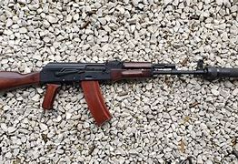 Image result for Suppressed AK-47