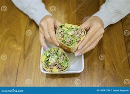 Image result for Handing Girl Burrito