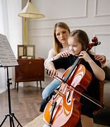 Image result for Child Playing Cello