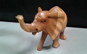 Image result for Wood Carved Animals