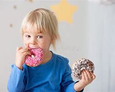 Image result for Kids Eating Donuts