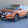 Image result for Orange Nissan Rogue