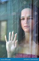 Image result for Sad Behind Glass Window