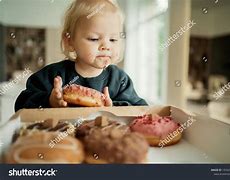 Image result for Kids Eating a Dount