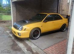 Image result for Subaru WRX Yellow