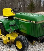 Image result for John Deere 4443 Tiller