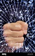 Image result for Fist Breaking Glass