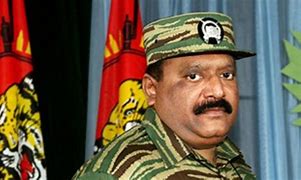 Image result for Tamil Tiger Leader Body