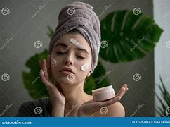 Image result for Woman Applying Face Cream