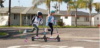 Image result for Kid On Electric Scooter