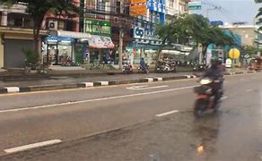 Image result for Busy City Street Raining