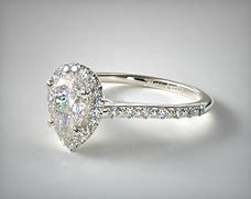 Image result for Pear Engagement Rings with Halo