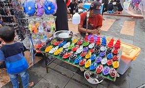 Image result for Ilustrasi Mainan Di Pasar Malam