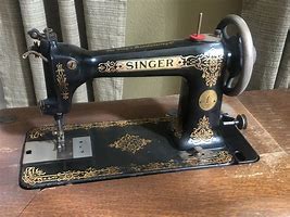 Image result for Singer Treadle Sewing Machine