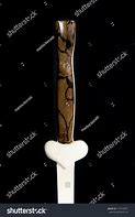 Image result for Pan with Sword Hilt