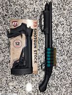 Image result for Mossberg 590 Adjustable Stock