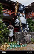 Image result for tanuki statue garden