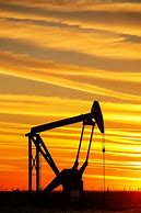 Image result for oil field pump jack sunset