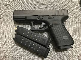 Image result for glock 9mm pistol