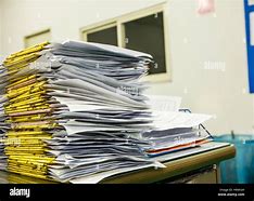 Image result for Pile of Mail On Desk