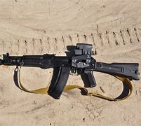 Image result for Suppressed AK-47