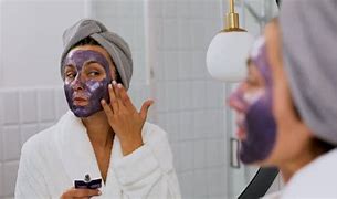 Image result for Woman Applying Face Cream