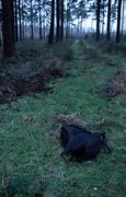 Image result for Backpack Lying On the Ground