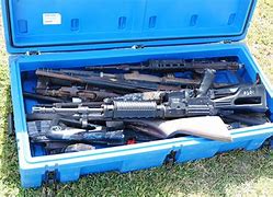 Image result for Stacks of Surrendered Guns