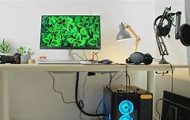 Image result for Organize Cords Under Desk