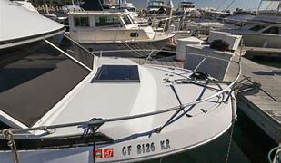 Image result for Bayliner 27 Cabin Cruiser