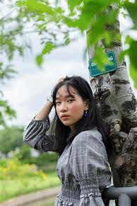 Image result for Sad Woman Leaning Against Tree