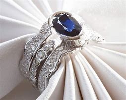 Image result for Diamond and Sapphire Wedding Sets