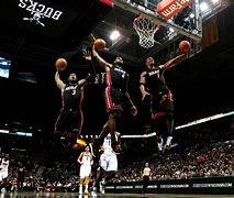 Image result for LeBron James Dunking Heat