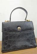 Image result for Tas Aigner