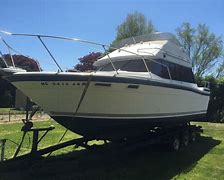 Image result for Bayliner 27 Cabin Cruiser