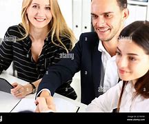 Image result for Hand Shake Man in Suit