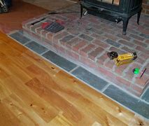 Image result for DIY Wood Flooring On Walls