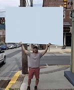 Image result for Guy Holding Up a Poster Meme