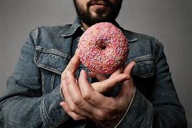 Image result for Person Eating Donut