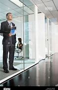 Image result for Glass Wall Preson Behind It