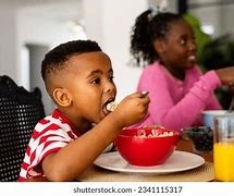 Image result for Kids Eating a Dount