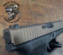 Image result for Bronze Glock Slide